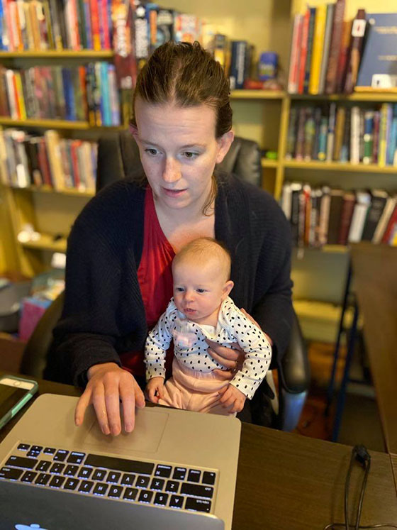 Image of woman working with baby