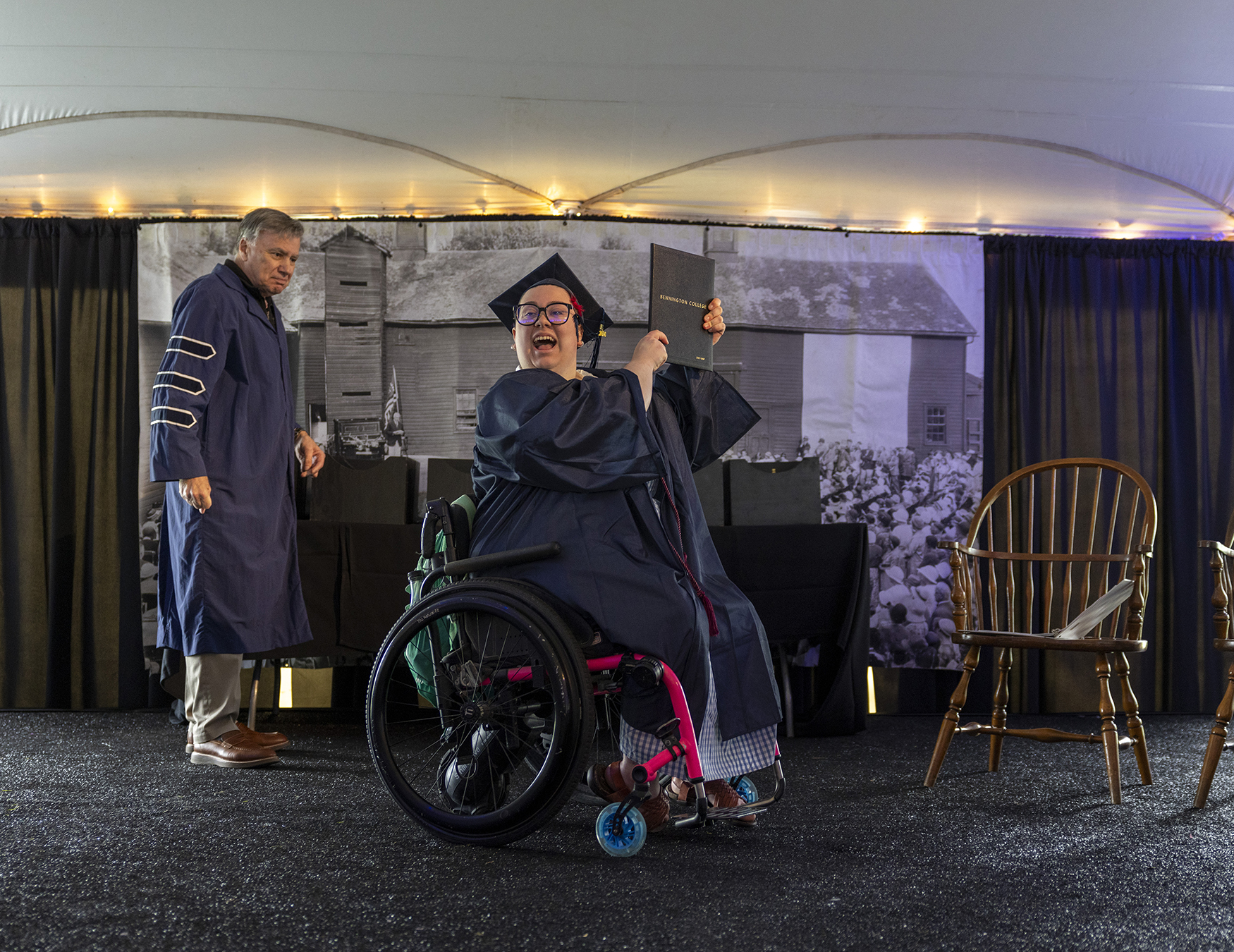 Zee Camp '26 receiving their diploma at Commencement