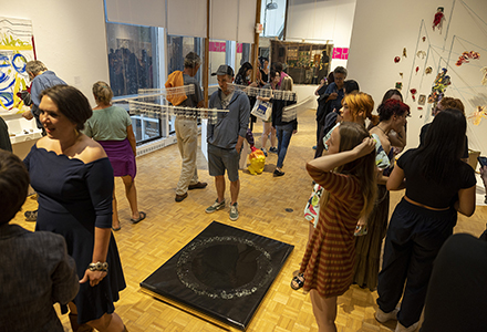 Image of people gathered at art show