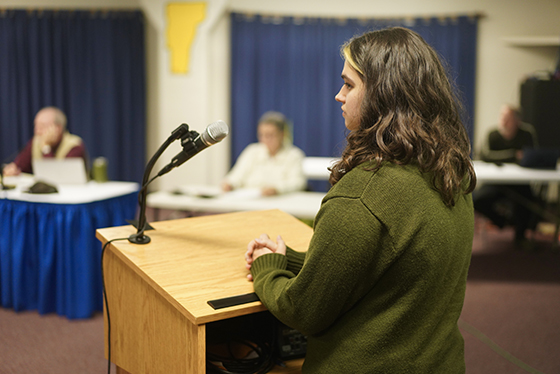 Image of student at podium