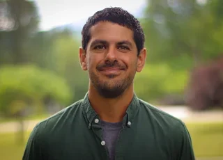 Portrait of Jared Della Rocca, director of library services