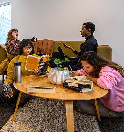 a group of friends read and share laughs