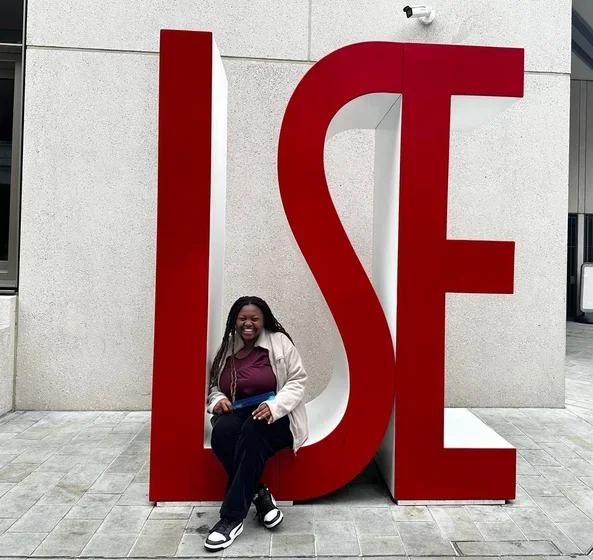 Student at London School of Economics sign