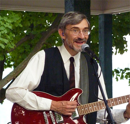 Joe Tucker on Guitar