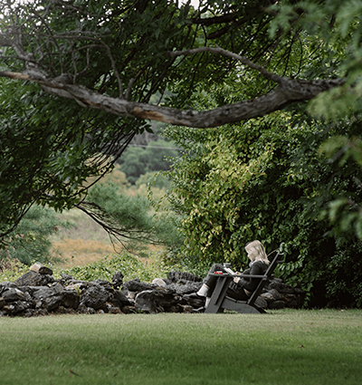 a student discovers reading on a sunny day by end of the world