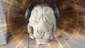 Stone Lion wearing Headphones