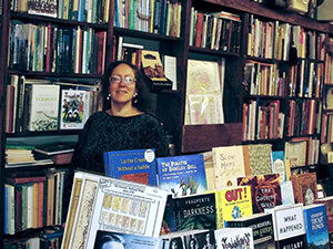 donna howard in the bookstore surrounded by books 