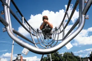 John Umphlett Performing Flipping One Over a Bush