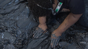 Image of Allana Clarke working in clay
