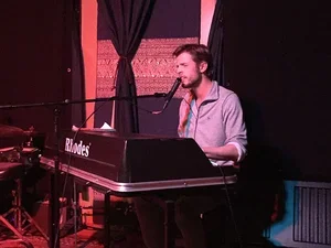 Michael Chinworth '08 in the Fireplace Room