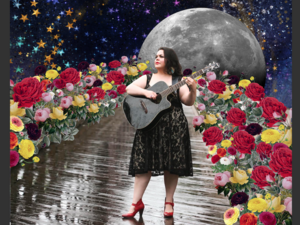 Diana Alvarez playing guitar in space with flowers