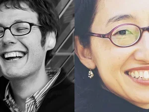 man in glasses laughing and woman wearing glasses smiling close up