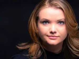 Téa Obreht young woman with blonde hair looks at the camera 