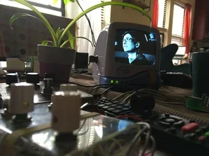 tv screen with female face on it 