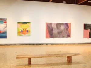 Inside view of gallery with art by mueller and wapner 