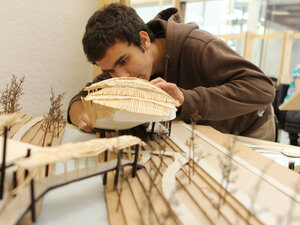 Bennington College student working on an architectural model