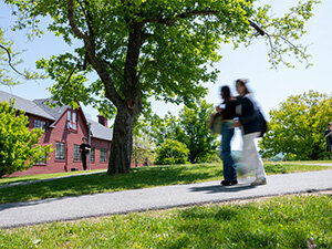 Bennington campus with two students walking on a path