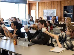 undergraduate student classroom as they discuss the solar eclipse