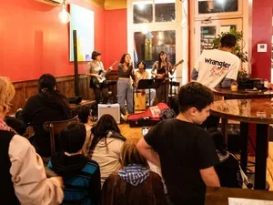Image of band playing in cafe