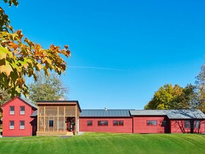 red building, green grass, bennington college health center
