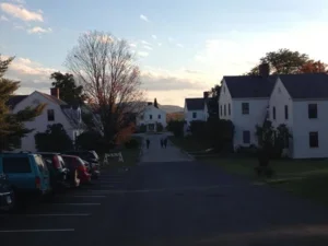 first street, houses and cars