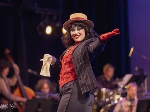 Image of woman performing onstage