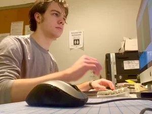 Image of Charlie Love on computer