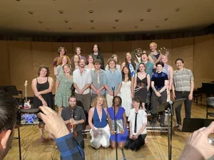 Image of smiling group of musicians