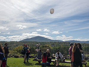 Photo of mountains and floating lantern