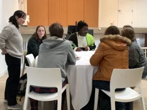 Image of group seated at table