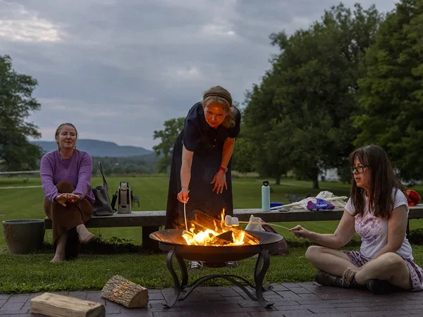 Woman roasting marshmallows