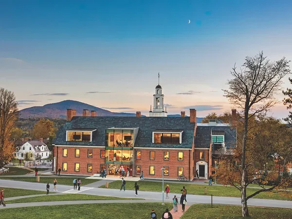 Aerial shot of students milling around Bennington College's Commons building
