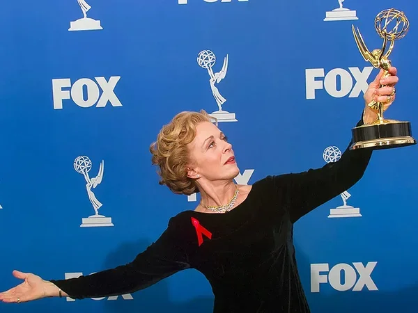 Image of Holland Taylor holding Emmy