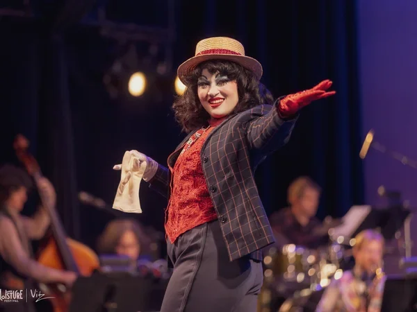 Image of woman performing onstage