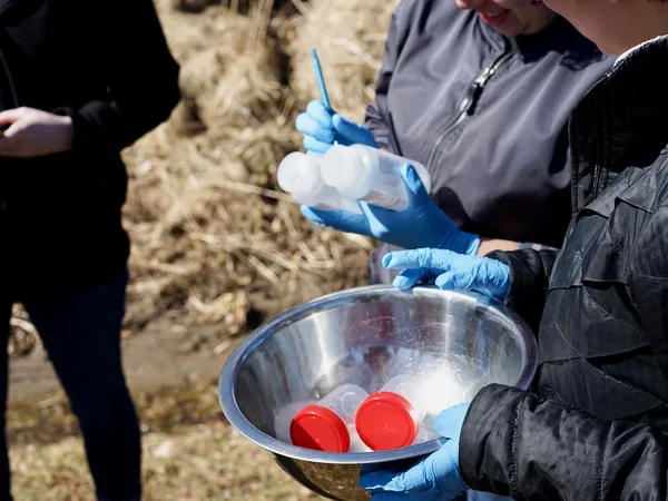 Bennington College professors and students collect soil and water samples in neighborhoods around Norlite hazardous waste incinerator in Cohoes, NY (photo by David Bond) 