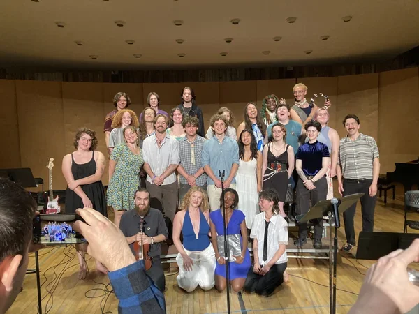 Image of smiling group of musicians
