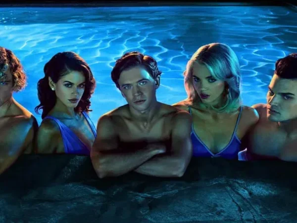Five teenagers in a swimming pool