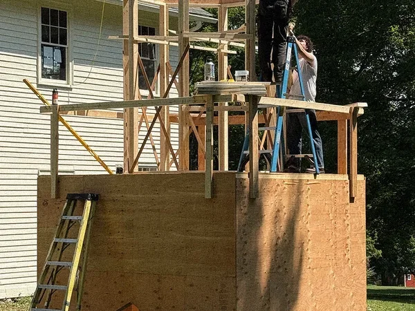 Image of students building cupola