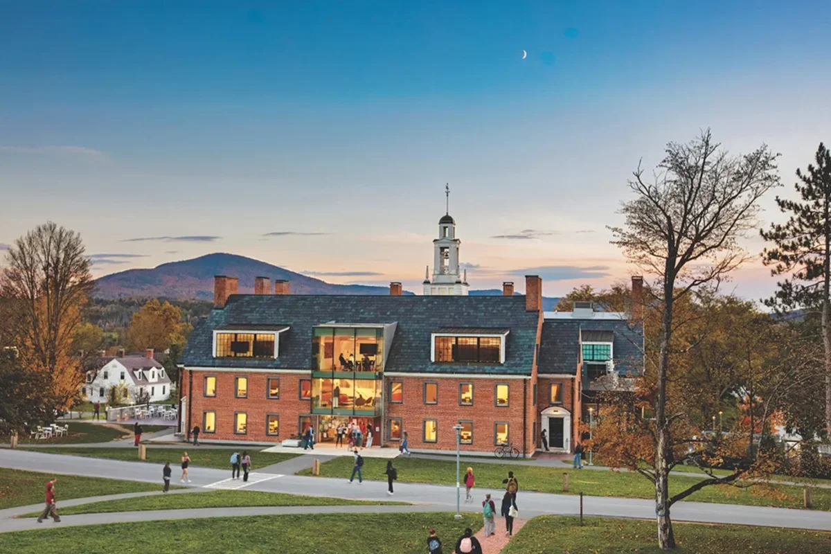 Aerial shot of students milling around Bennington College's Commons building