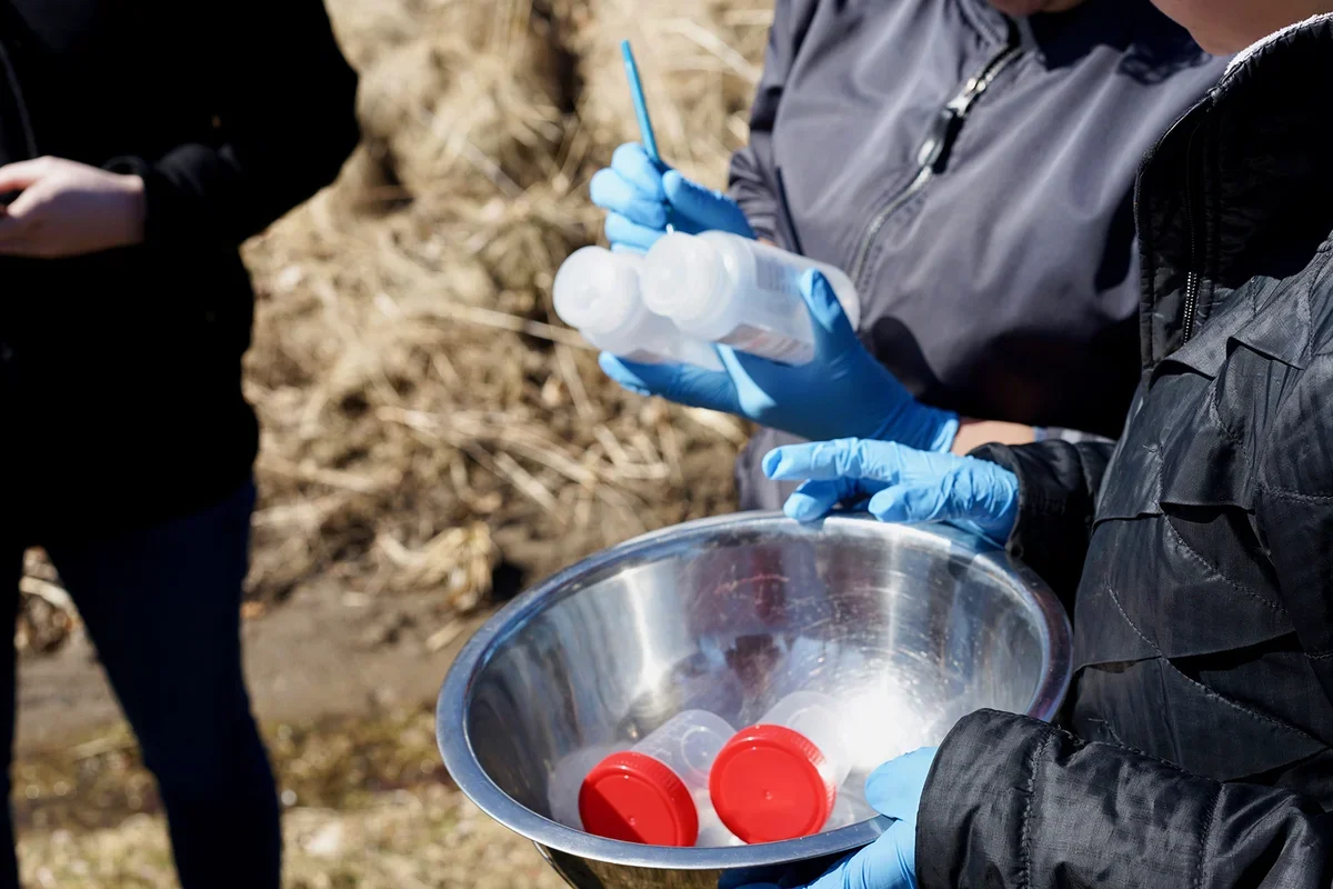 Bennington College professors and students collect soil and water samples in neighborhoods around Norlite hazardous waste incinerator in Cohoes, NY (photo by David Bond) 