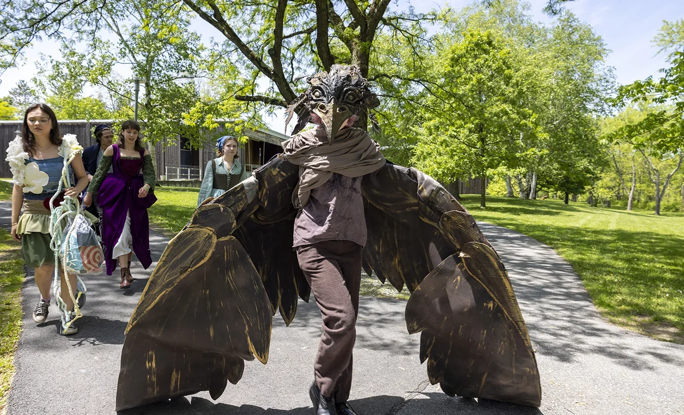 Image of person in bird costume
