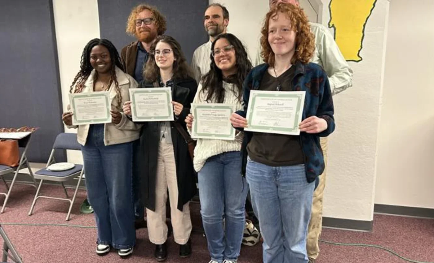Image of students posing with certificates