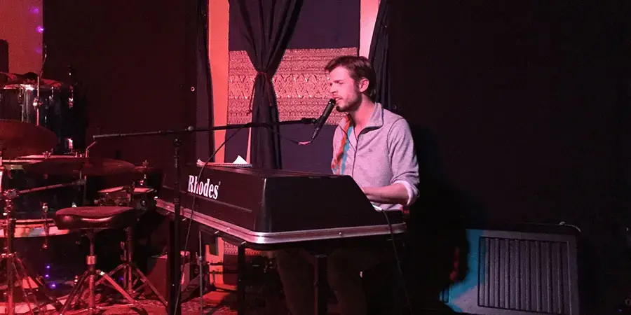 Michael Chinworth '08 in the Fireplace Room