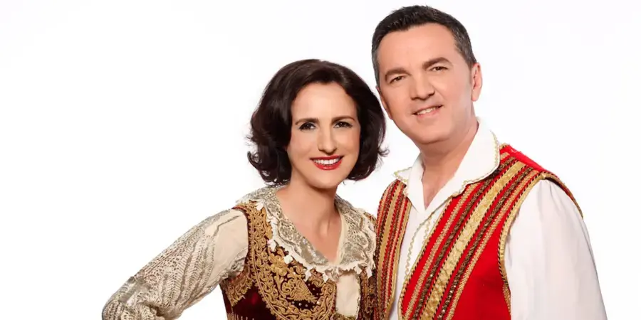 woman and man in traditional costume on white background