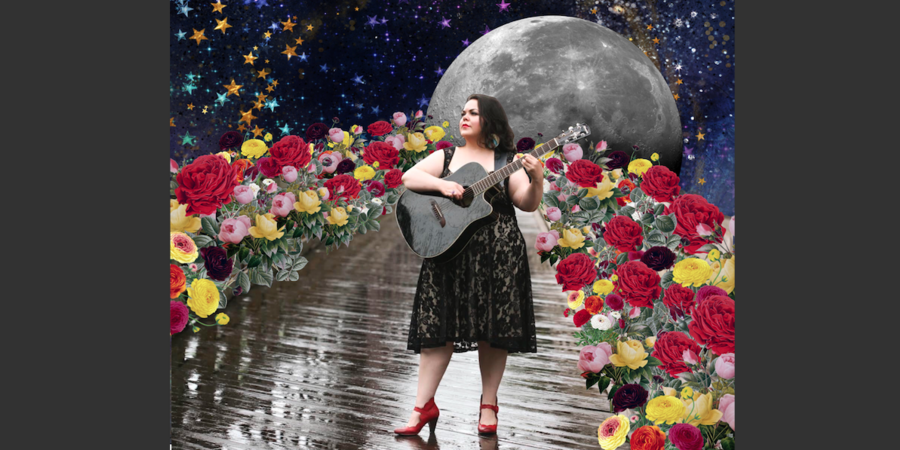 Diana Alvarez playing guitar in space with flowers