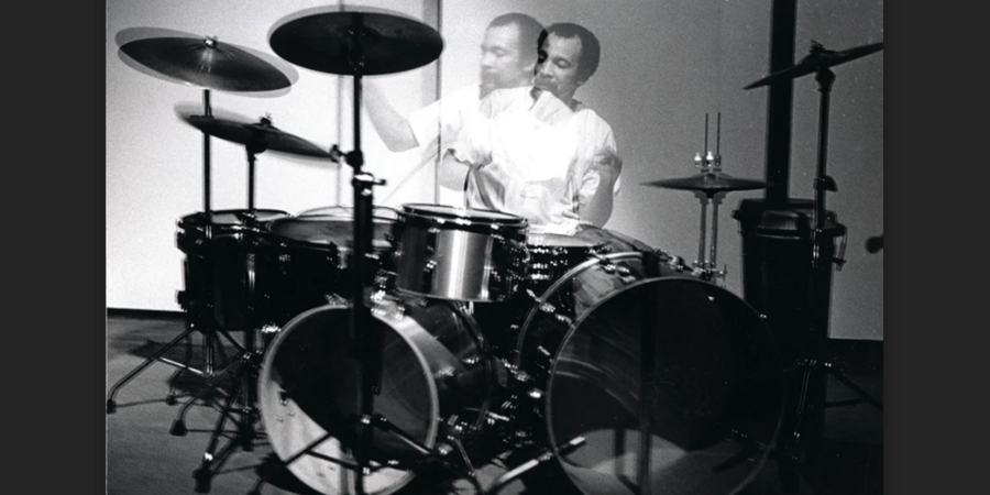 black and white photo of Milford Graves at a drum kit