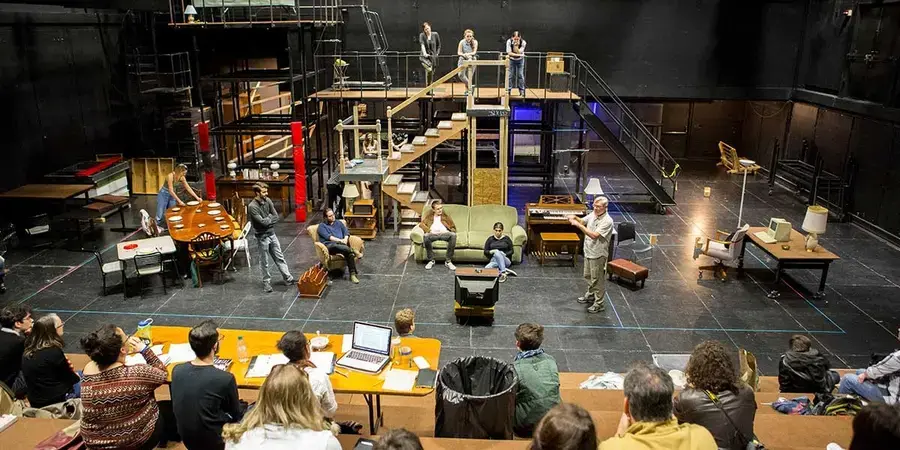 theatre sets and students in a black box theatre