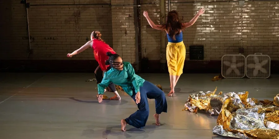 Image of three dancers