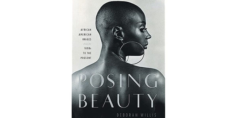 the book cover for Posing Beauty, which shows a Black woman with a shaved head in profile