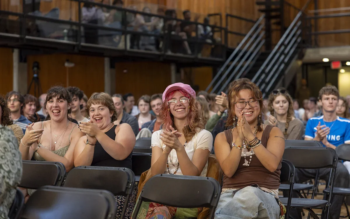 Image of clapping students